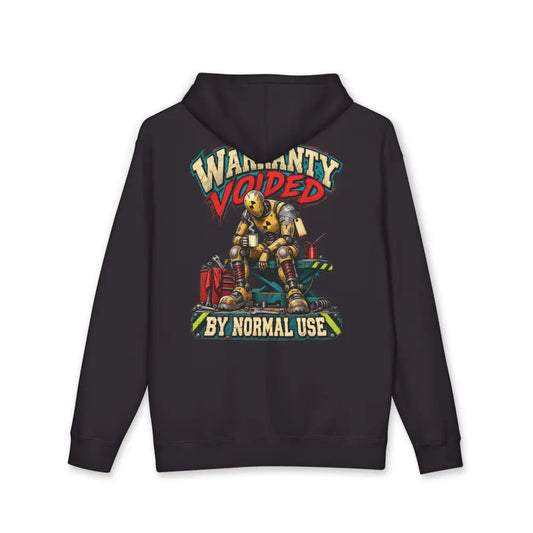 Black unisex mechanic hoodie with ribbed cuffs featuring a yellow robot graphic and warranty voided by normal use text, machine wash care instructions