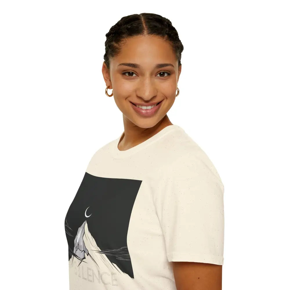 Smiling woman with braided hair wearing a unisex softstyle Mountain Silence T-Shirt featuring mountain graphic
