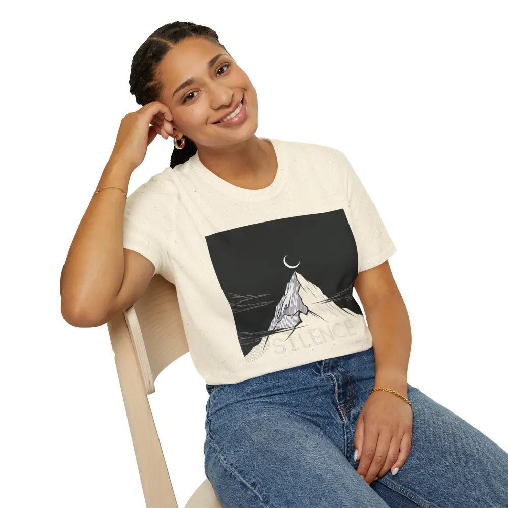 Woman wearing cream unisex softstyle Mountain Silence T-Shirt with mountain graphic outdoors