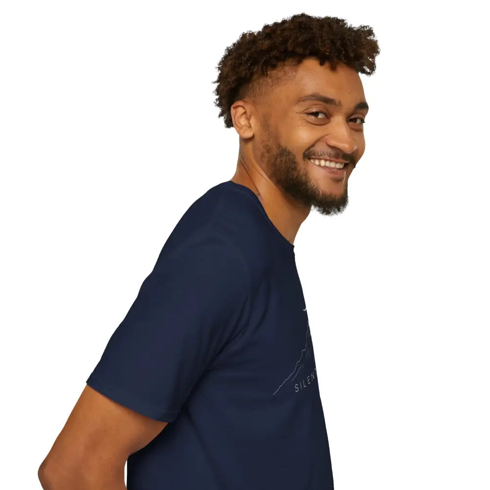 Man with curly hair and beard wearing a softstyle mountain-themed T-shirt with ribbed knit collar