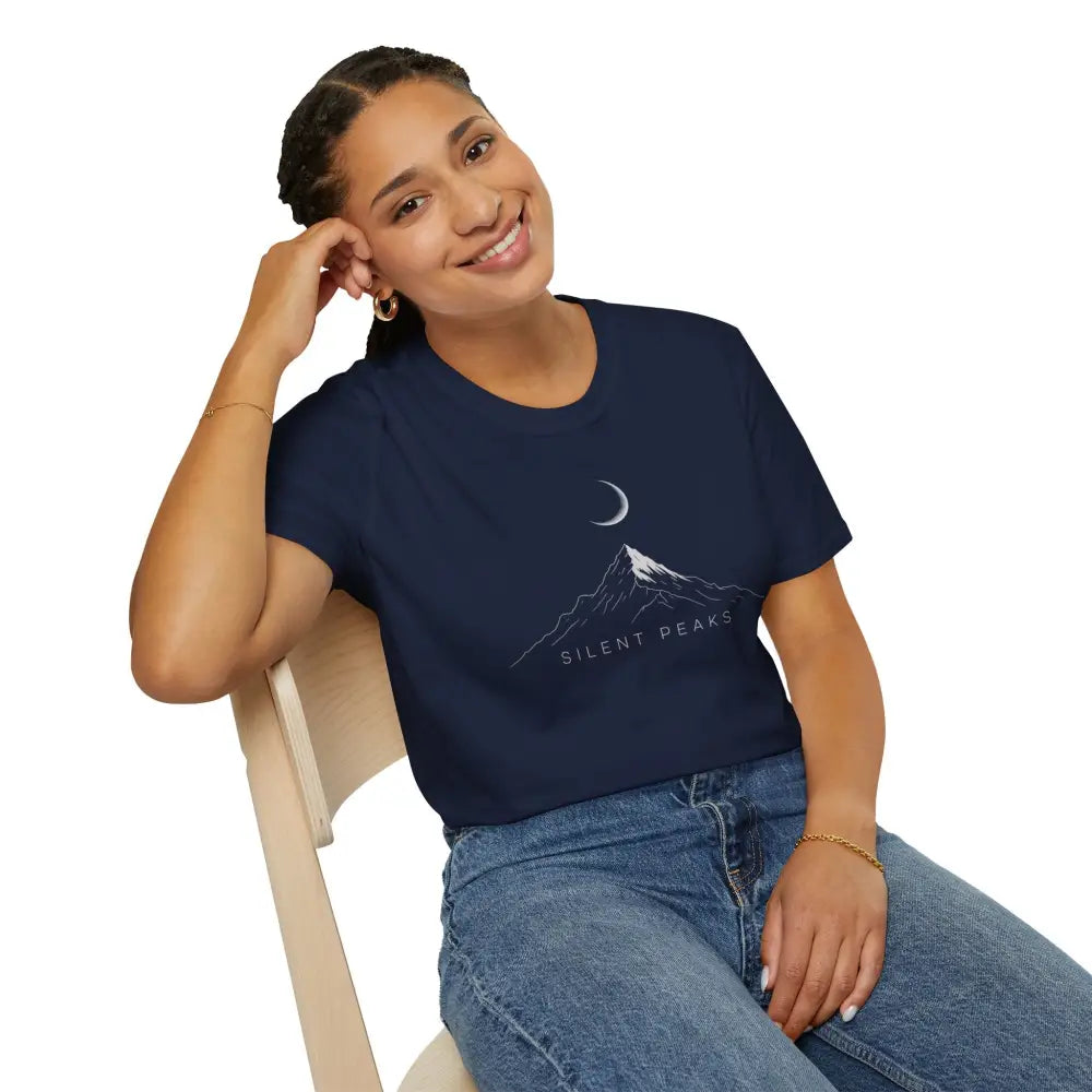 Woman wearing navy blue softstyle t-shirt with mountain and crescent moon graphic, eco-friendly design