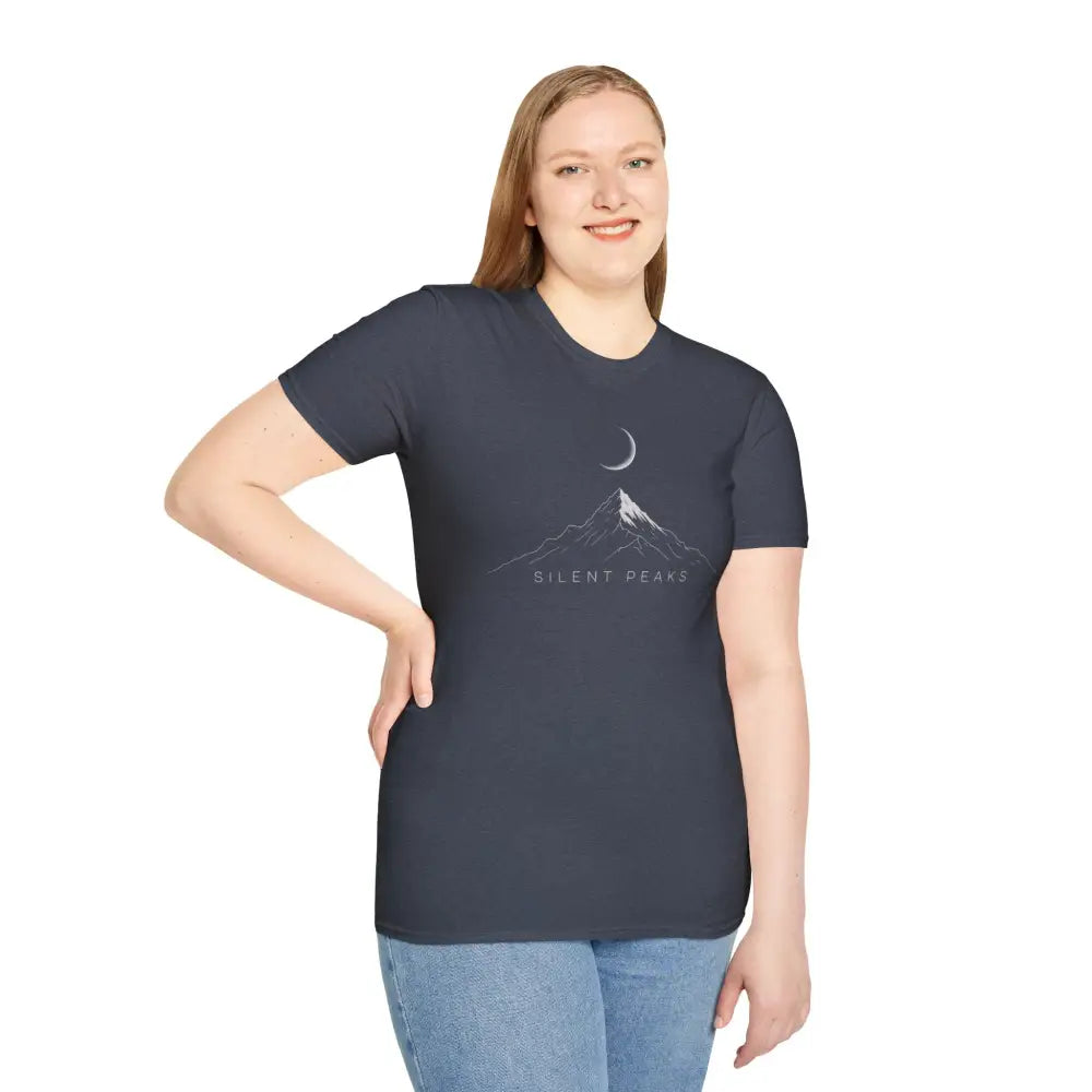Woman wearing a softstyle t-shirt with mountain and crescent moon graphic, eco-friendly design