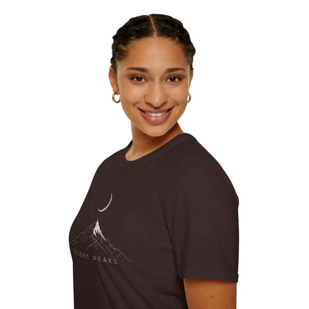 Woman with braided hair wearing a mountain and crescent moon graphic softstyle t-shirt with ribbed knit collar