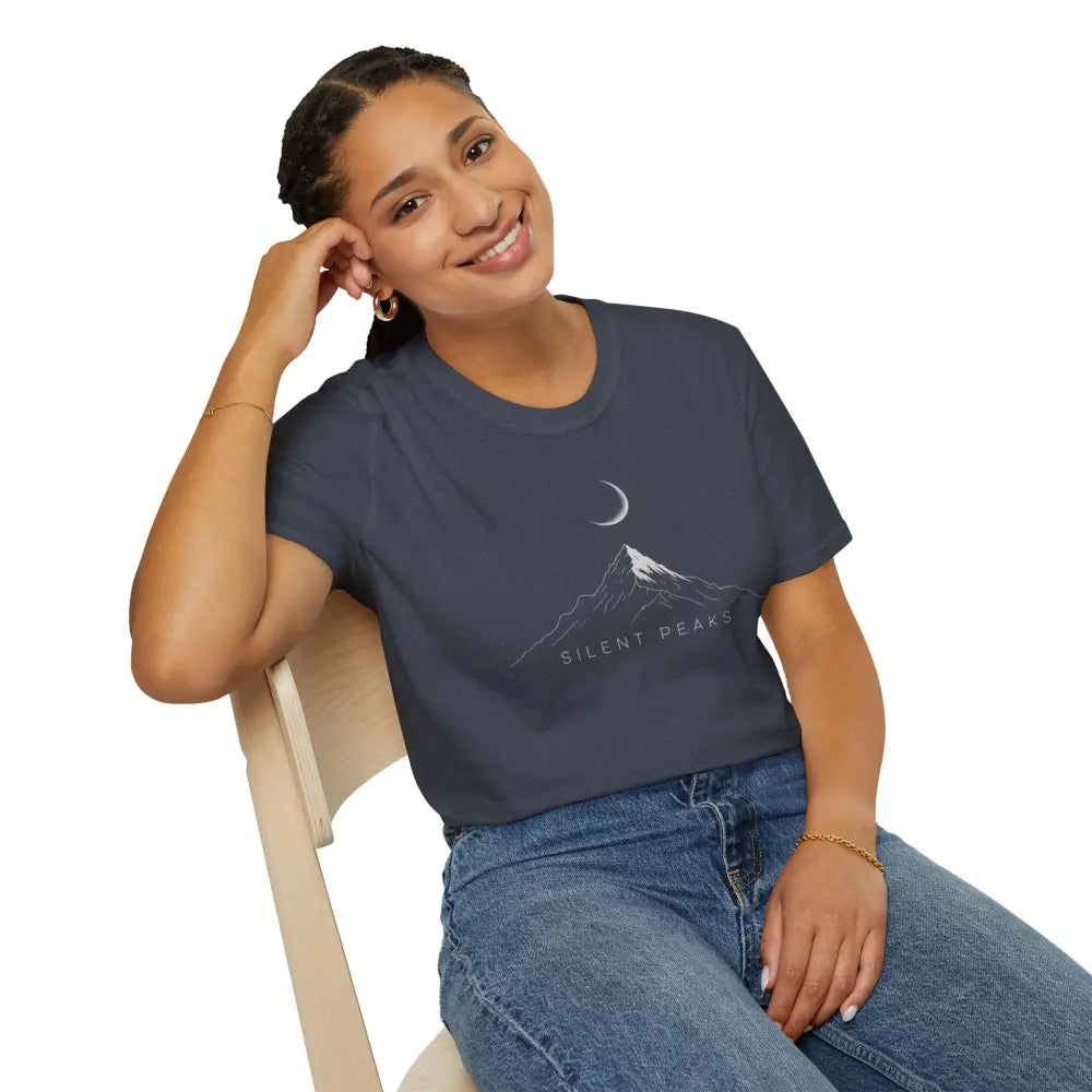Woman wearing a softstyle t-shirt designed with mountain and crescent moon graphic, eco-friendly fabric