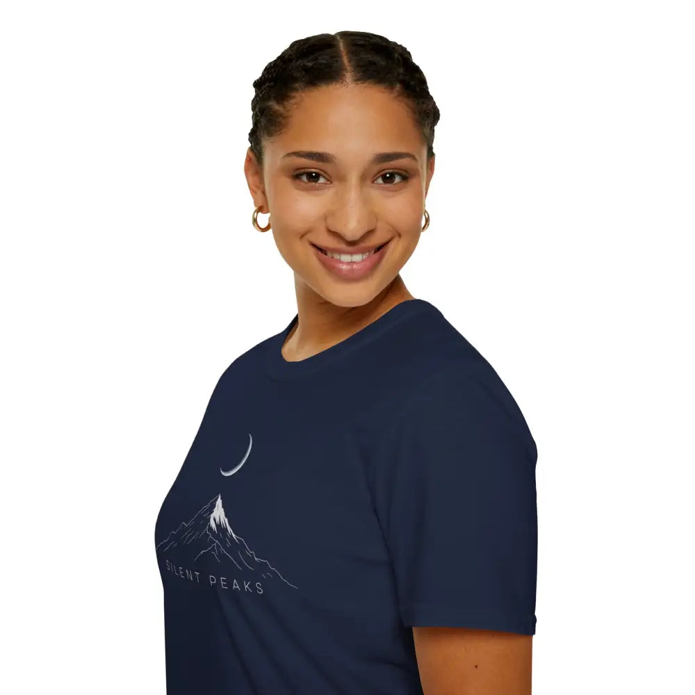 Woman wearing a navy blue softstyle t-shirt designed with mountain and crescent moon graphic
