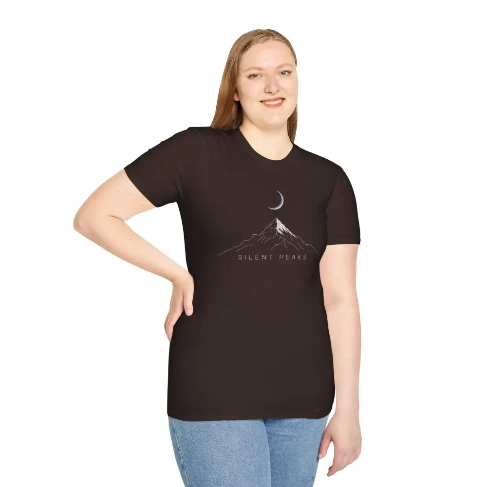 Woman wearing a softstyle t-shirt designed with mountain and moon graphic, eco-friendly fabric