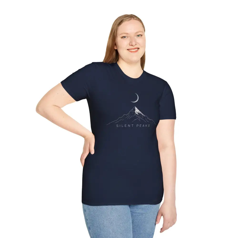 Smiling woman in a softstyle T-shirt designed with a crescent moon and mountain graphic