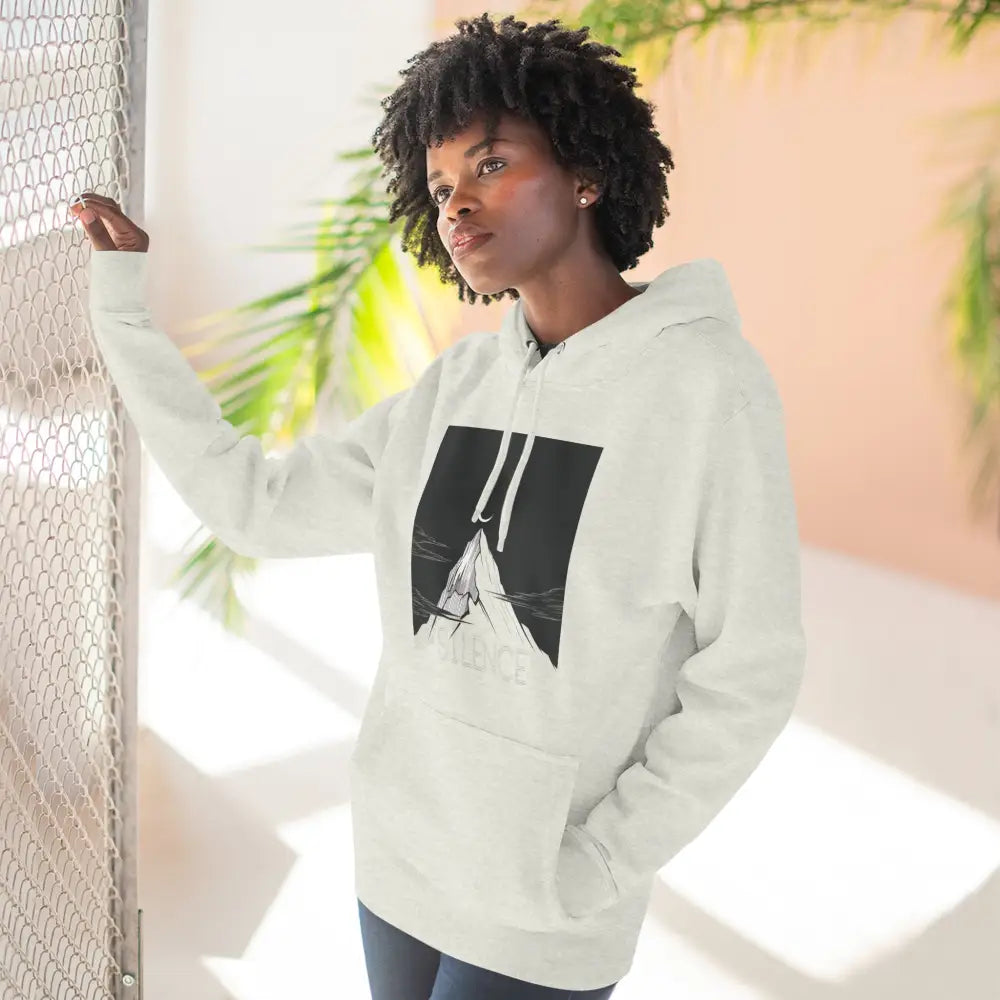 Woman wearing Mountain Vibes Fleece Unisex Hoodie with mountain graphic, cozy outdoor wear
