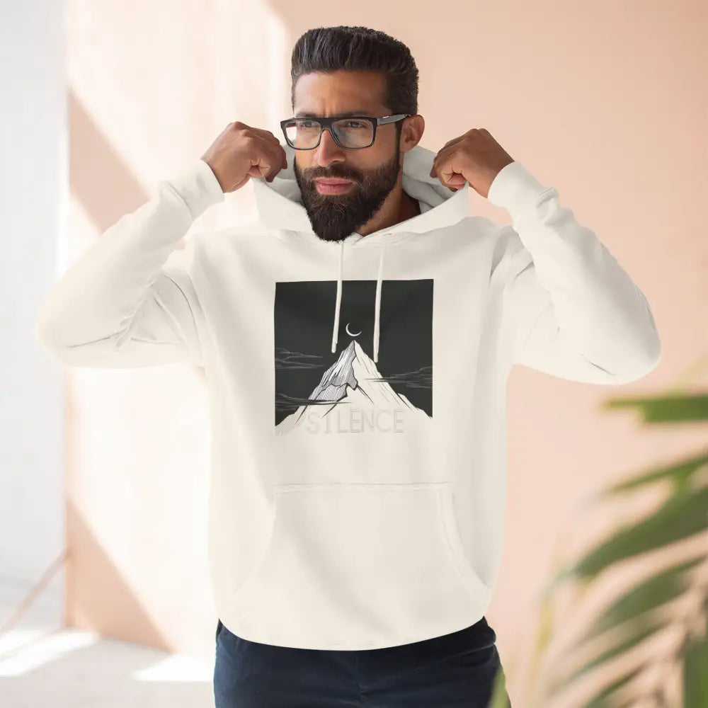 Man wearing Mountain Vibes Fleece Unisex Hoodie with mountain graphic, cozy outdoor style