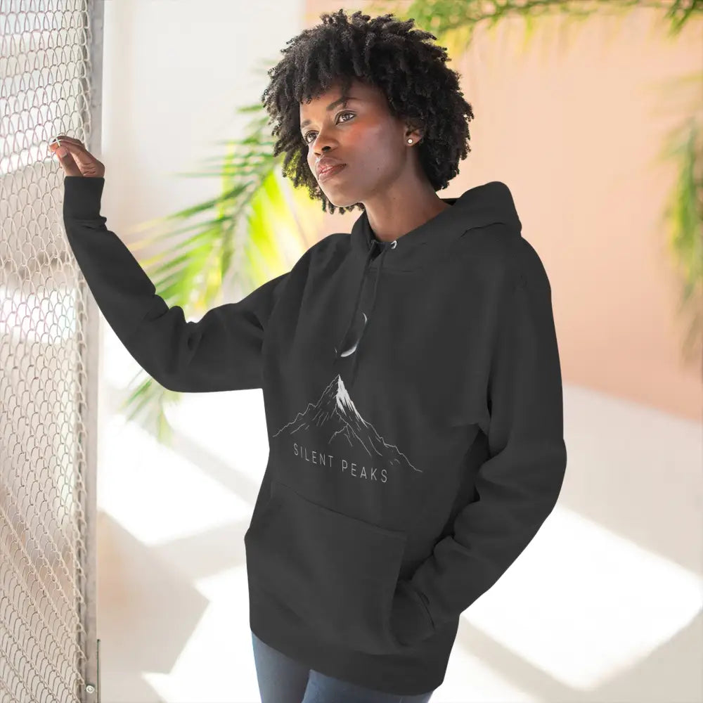 Black hooded sweatshirt with mountain and crescent moon graphic, machine wash max 30c, cozy outdoor wear
