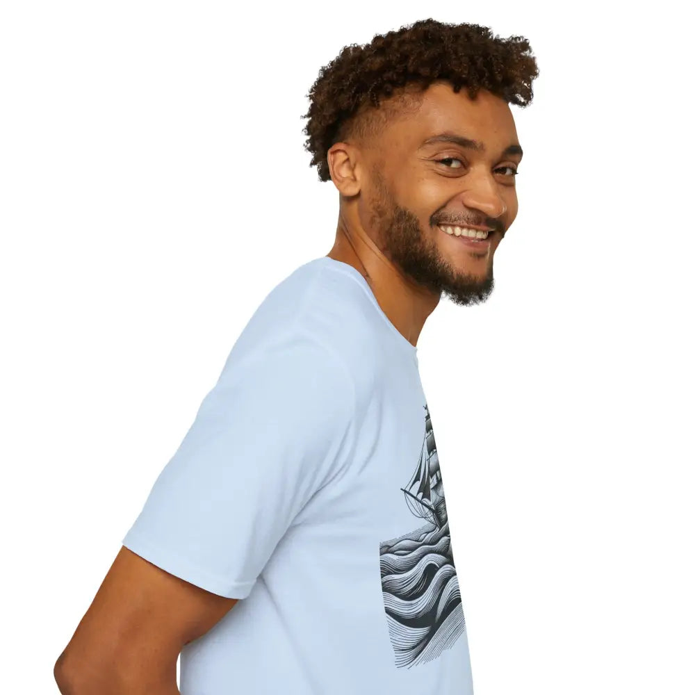 Light blue unisex t-shirt with ship at sea design, elastic ribbed collar, reduces fabric waste