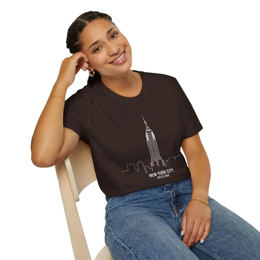 Smiling woman in dark brown crop top and blue jeans wearing New York City Skyline T-Shirt