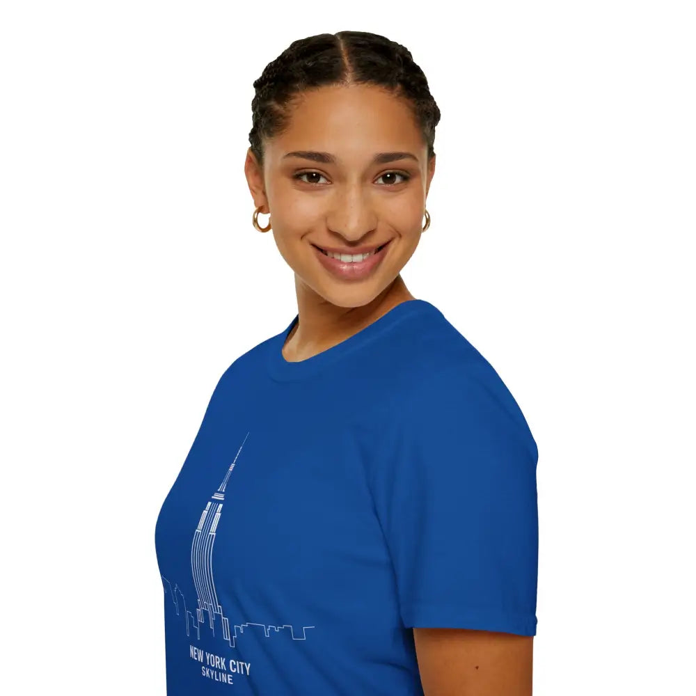 Woman in blue NYC skyline T-shirt, machine washable, low heat tumble dry urban fashion