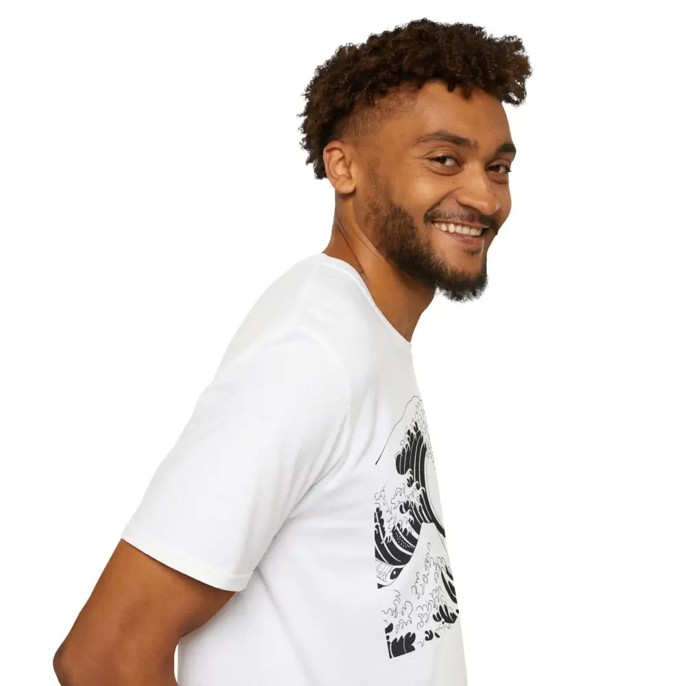 Man with beard and curly hair wearing Ocean Wave Unisex T-Shirt with black wave design