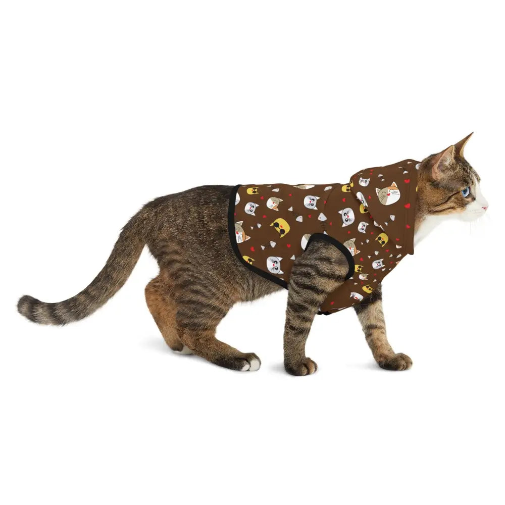 Tabby cat wearing a stylish brown patterned Pet Hoodie from PixiOnyx Cozy Critterwear