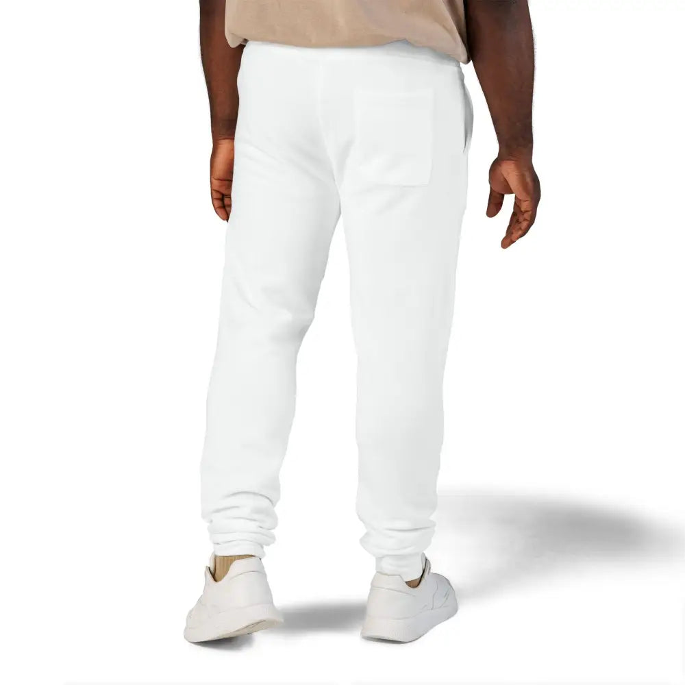 Person wearing plain white PixiOnyx Unisex Fleece Sweatpants for cozy casual wear