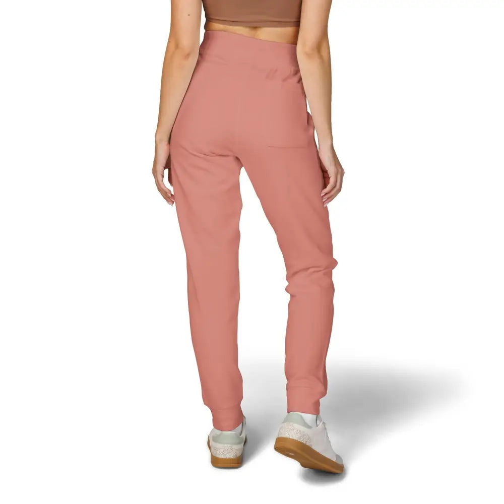 Women’s high-waisted tapered pink joggers in unisex fleece sweatpants for relaxed comfort