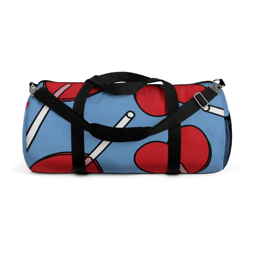 Blue duffel bag with red and white lollipop pattern, stylish duffel bag for travel
