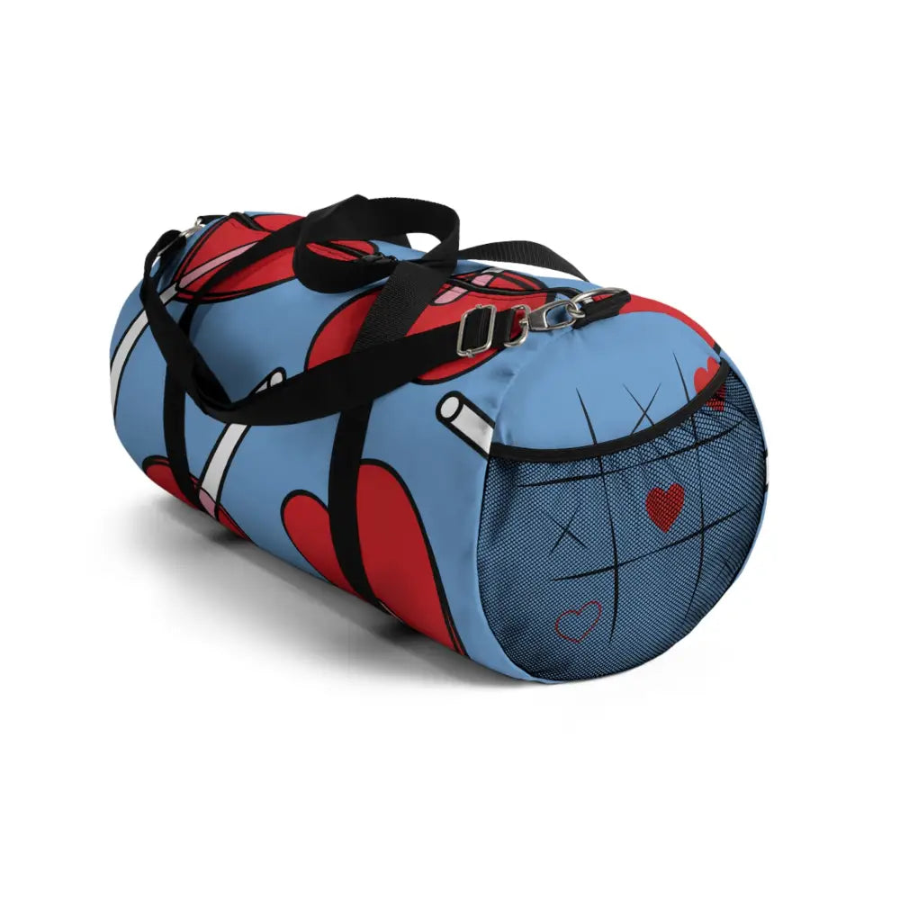 Stylish duffel bag with red heart and white pipe patterns, black straps, mesh pocket