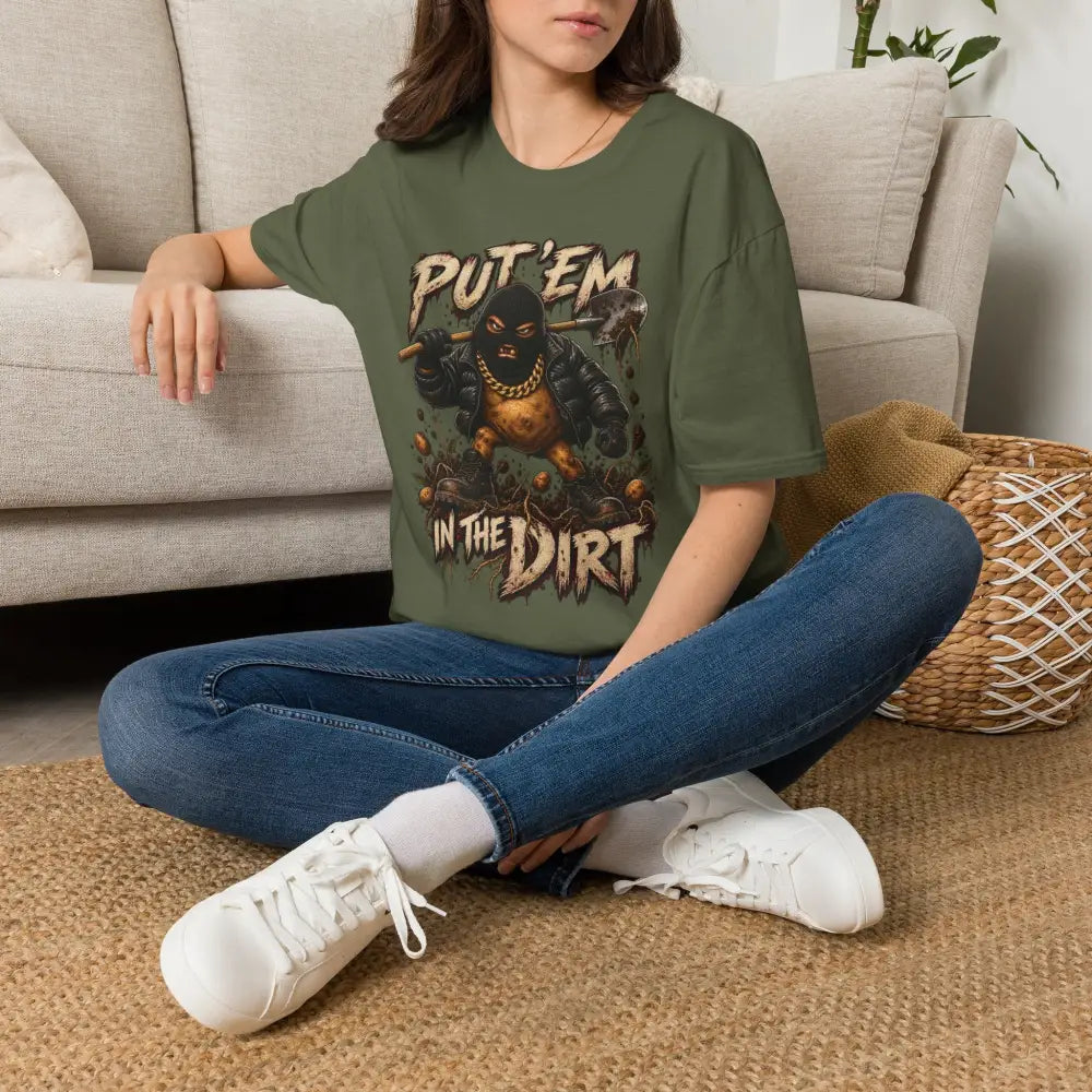 Olive green oversized put em in the dirt t shirt with masked figure graphic made of ring spun cotton tubular knit