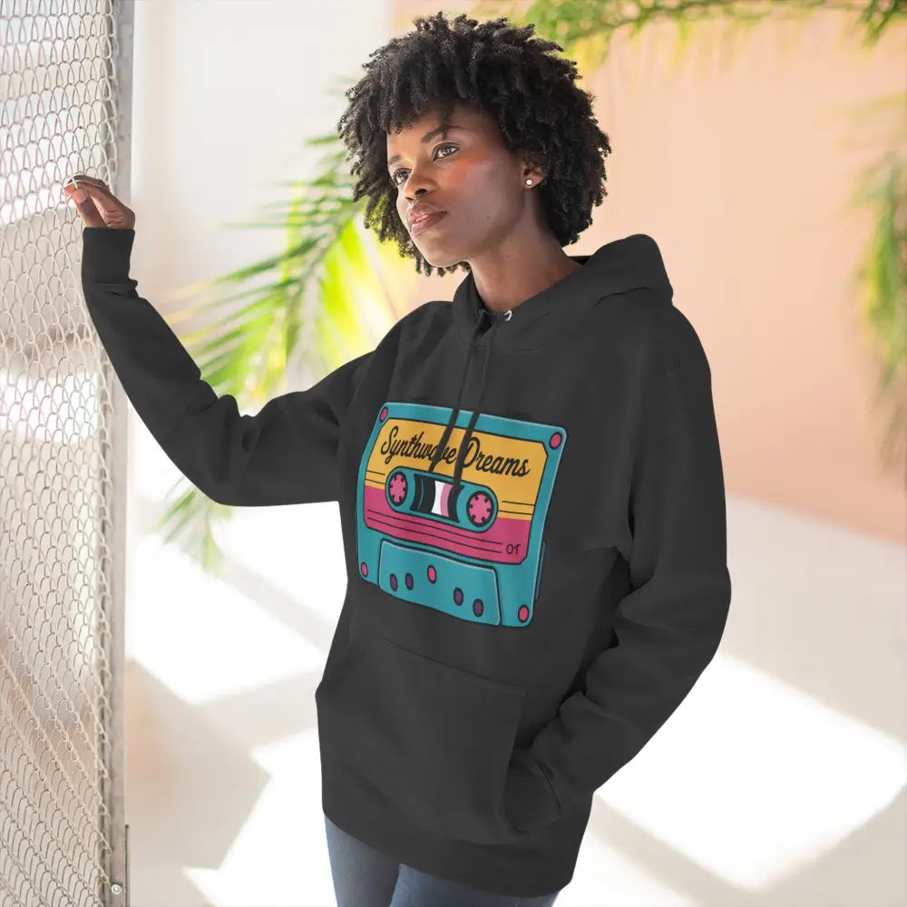 Black hoodie with colorful cassette tape graphic, machine wash cold, low heat safe, retro music style