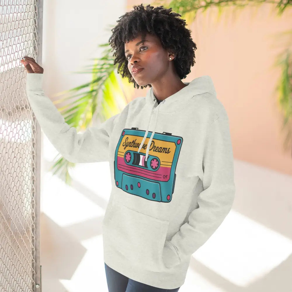 Woman in white hoodie with colorful cassette tape graphic, vintage music streetwear, machine wash max 30c