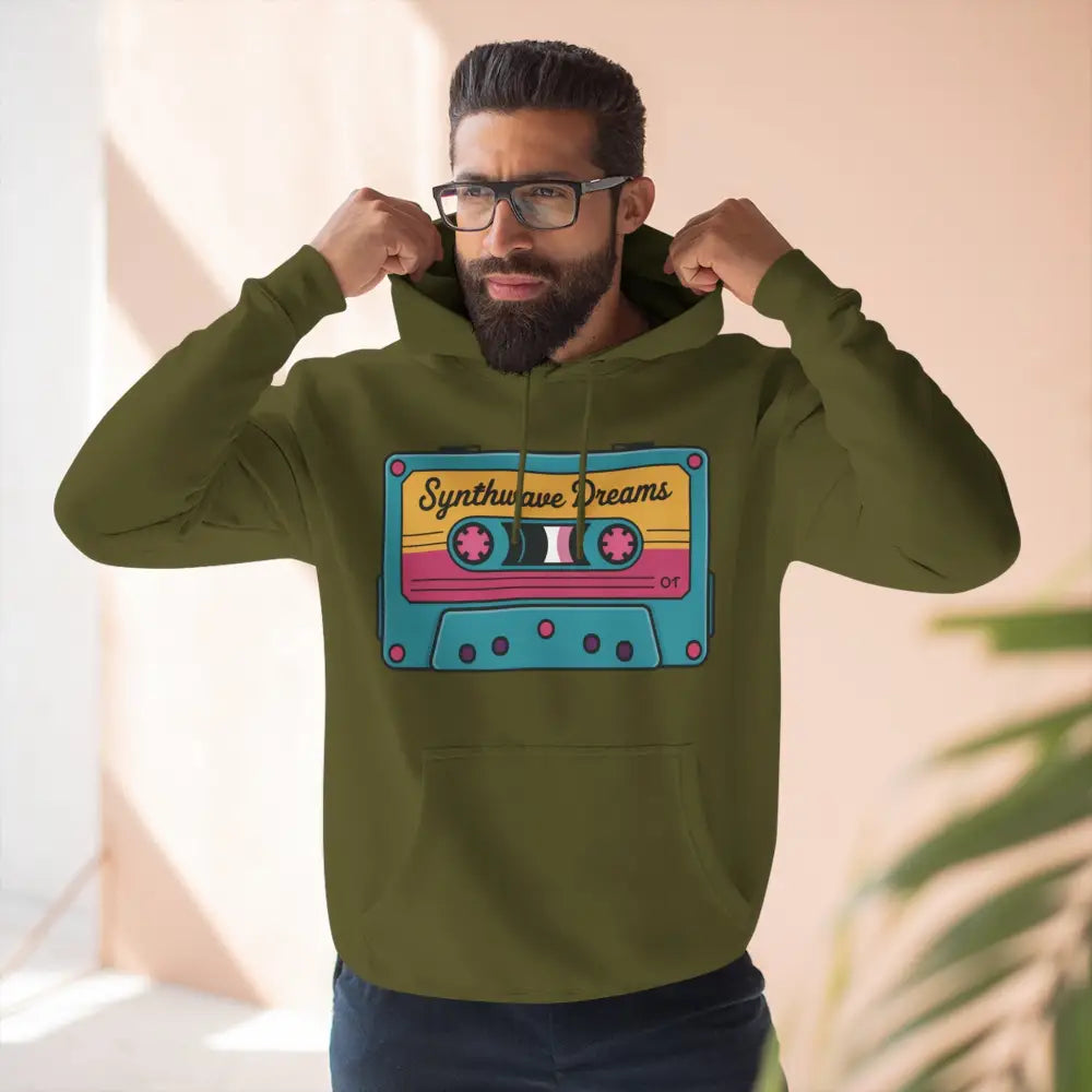 Man wearing olive green hoodie with Synthwave Dreams cassette graphic, machine wash max 30c