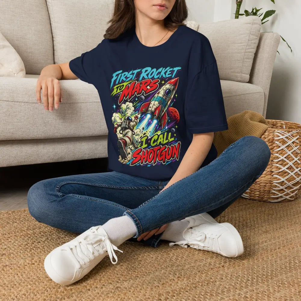 Navy blue rocket to mars unisex t-shirt with colorful graphic and text care instructions recommend low heat tumble dry