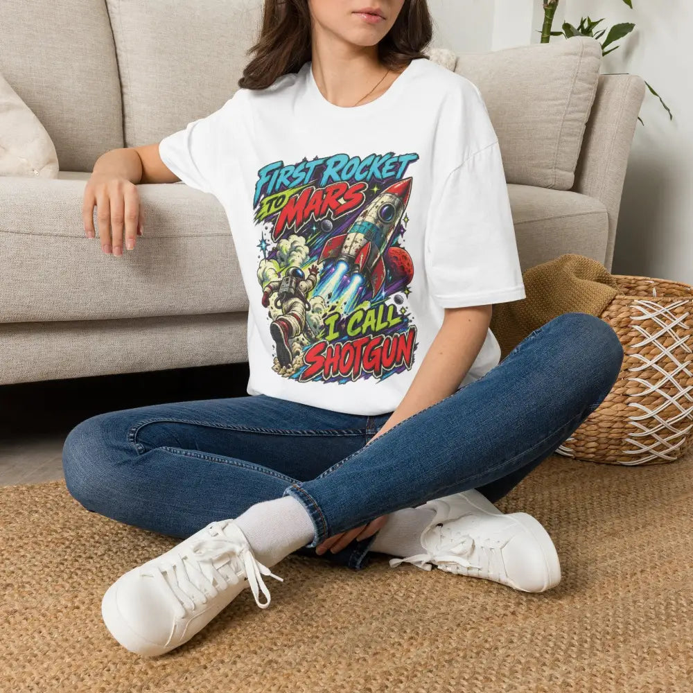 White cotton rocket to mars unisex t-shirt with colorful graphic and first rocket to mars text tumble dry low heat care instructions