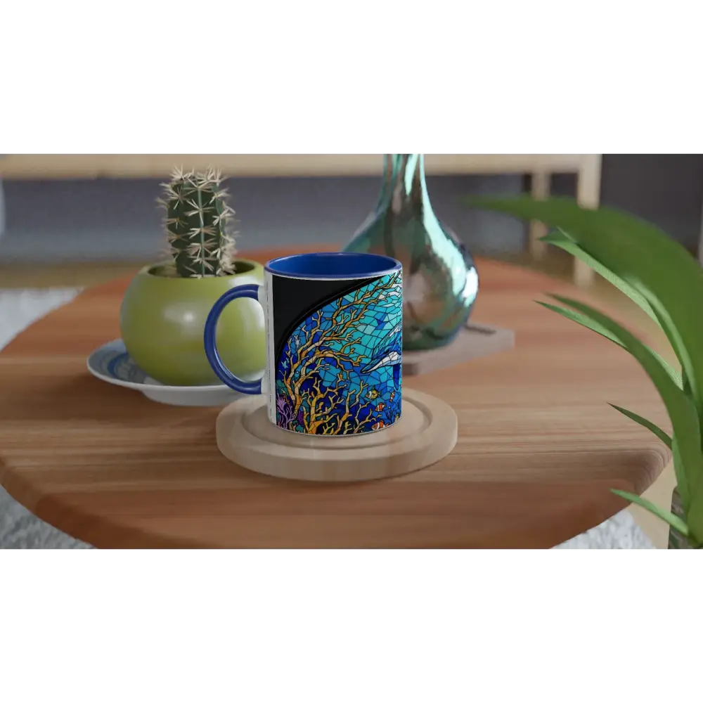 Blue-rimmed Sea Cathedral ceramic mug with colorful ocean design and green accent