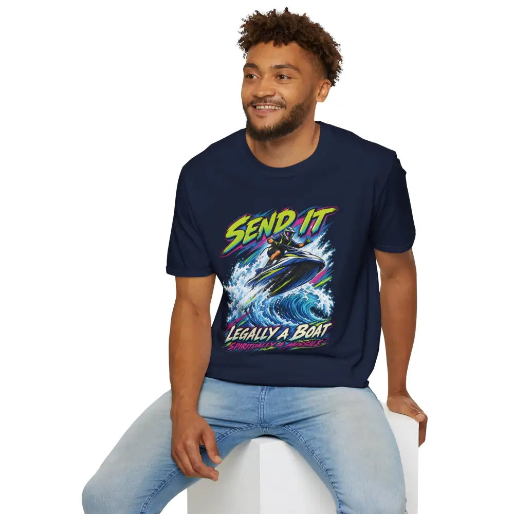 Navy blue unisex short-sleeved t-shirt with vibrant jet ski graphic and neon send it legally a boat text care instructions low heat tumble dry