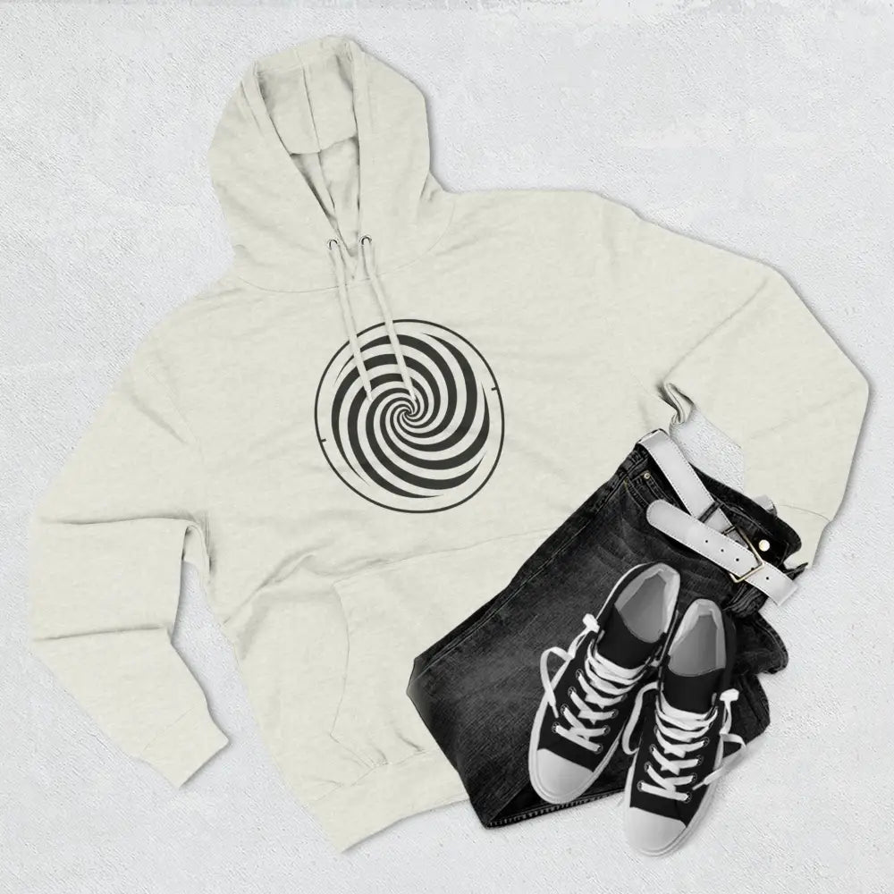 Cream-colored fleece hoodie with black and white spiral design, spacious kangaroo pocket