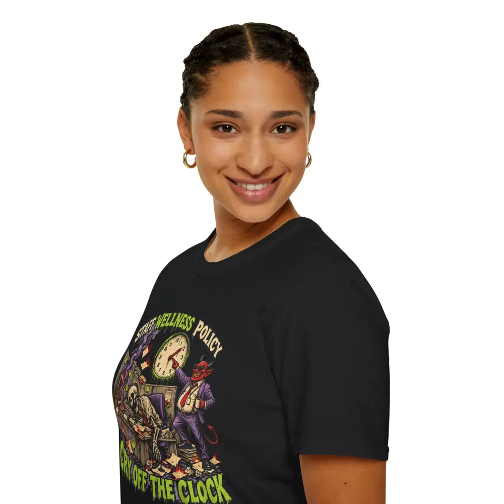 Black unisex t-shirt with colorful devil graphic pointing at clock featuring wellness policy text and care instructions for low heat