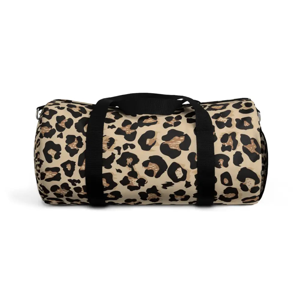 Chic leopard print duffel bag with black straps, adjustable shoulder strap, and internal zipper pocket