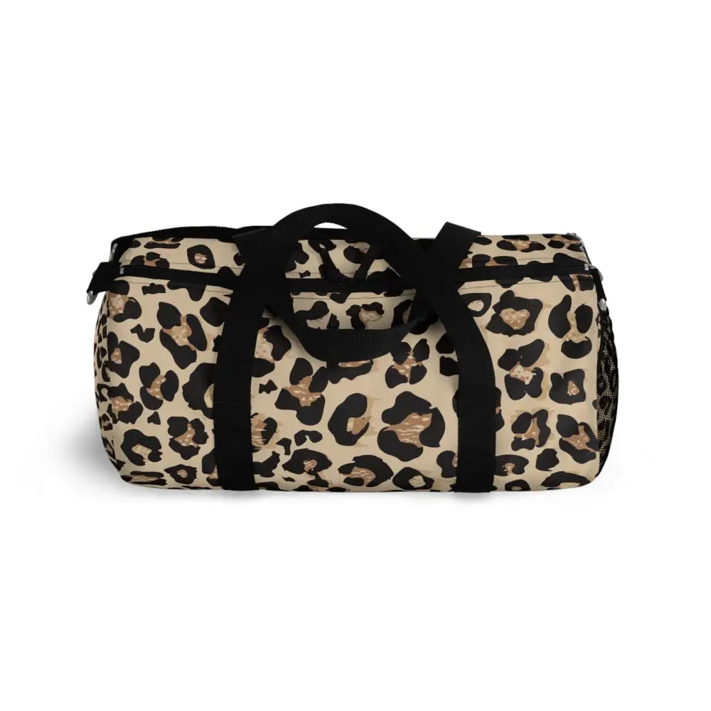 Chic leopard print duffel bag with black handles, adjustable shoulder strap, and internal zipper pocket