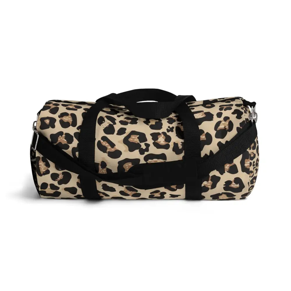Chic leopard print duffel bag with black straps, adjustable shoulder strap, and internal zipper pocket