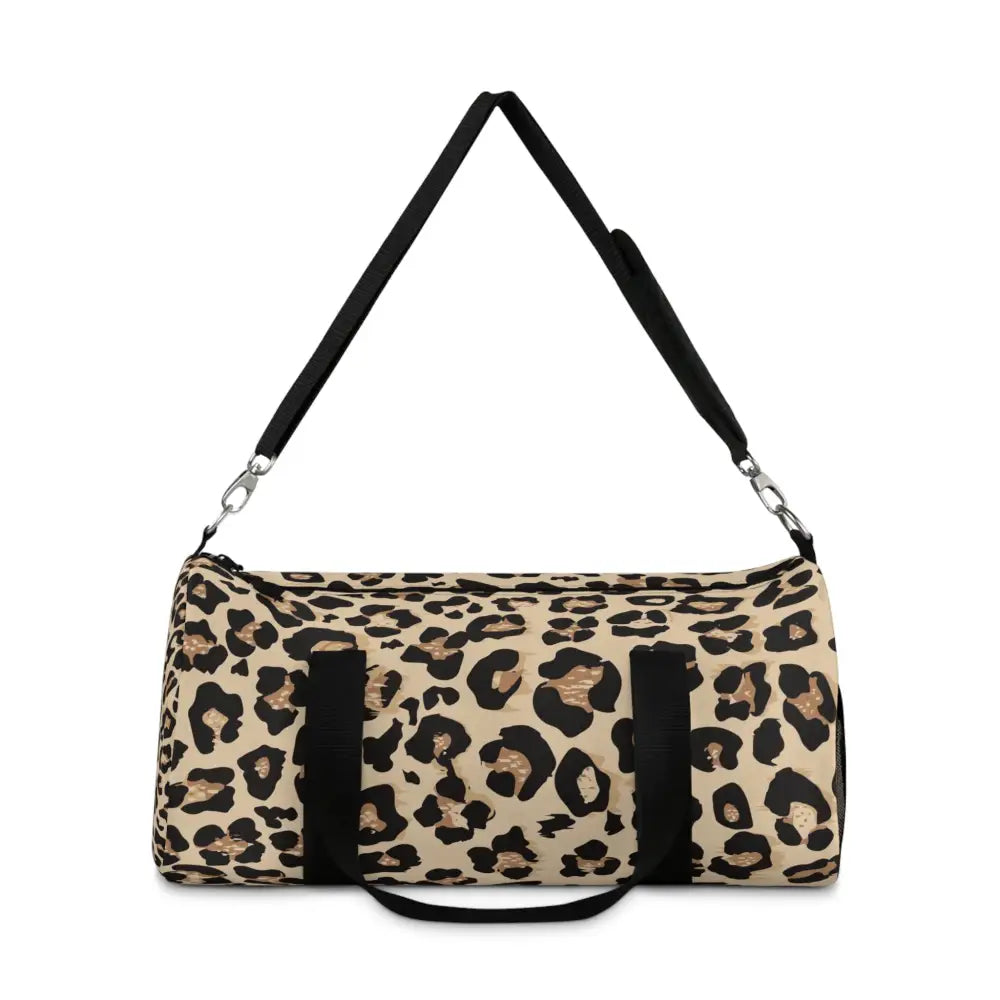 Chic leopard print duffel bag with black straps, adjustable shoulder strap, and internal zipper pocket