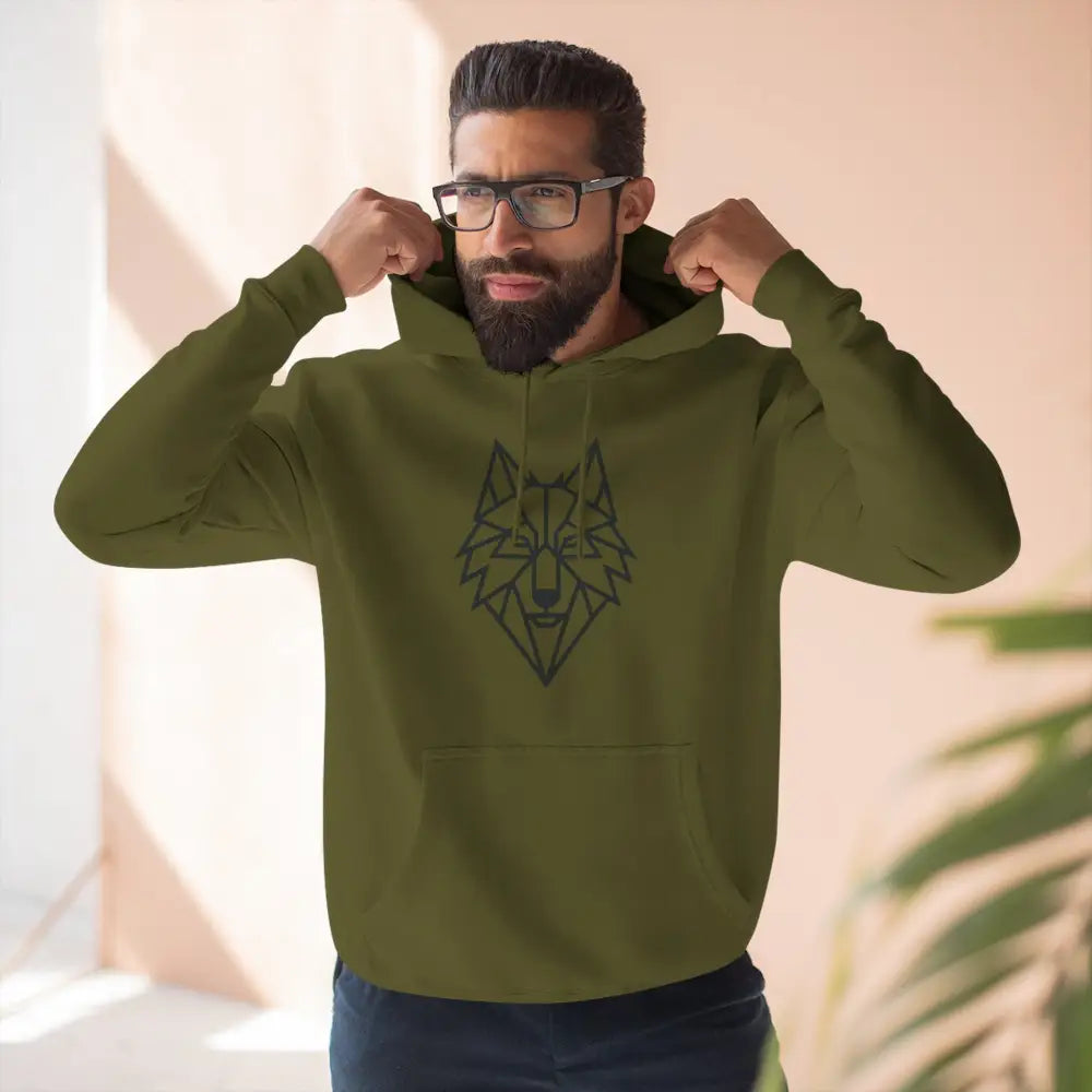 Man modeling stylish wolf graphic unisex hoodie with geometric wolf design for outdoor adventures