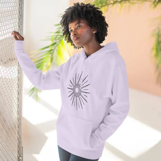 Woman in white fleece hoodie with sun graphic, spacious kangaroo pocket, cozy casual wear