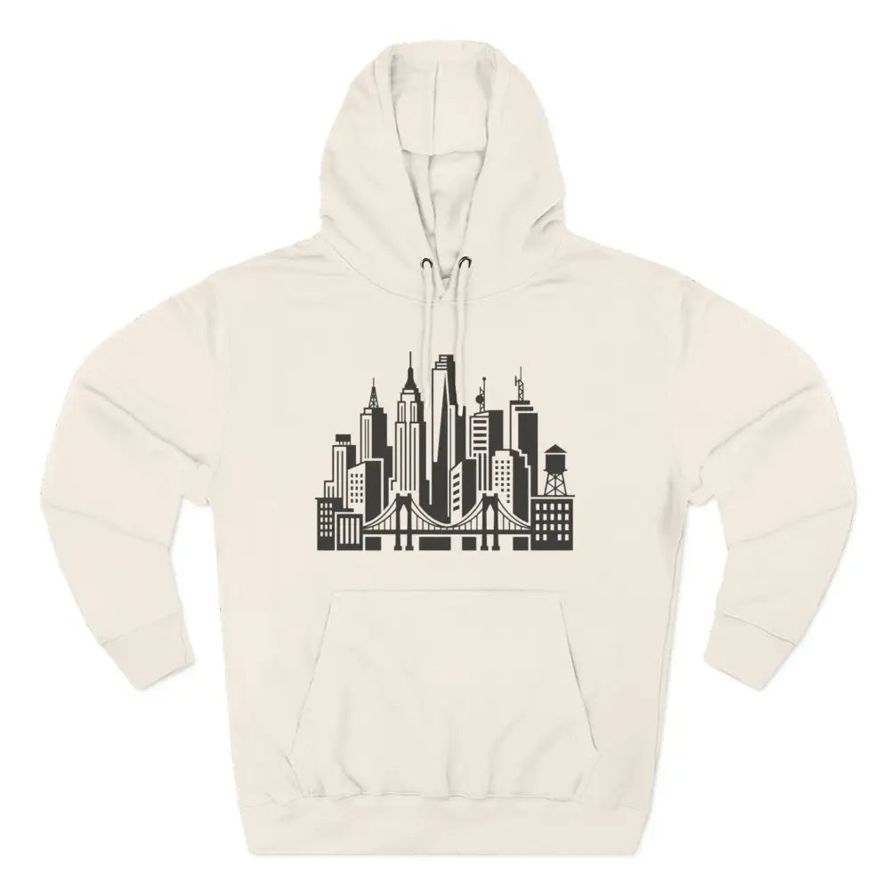 Cream-colored unisex city skyline hoodie with black urban bridge print featuring three-panel hood and low shrinkage fabric