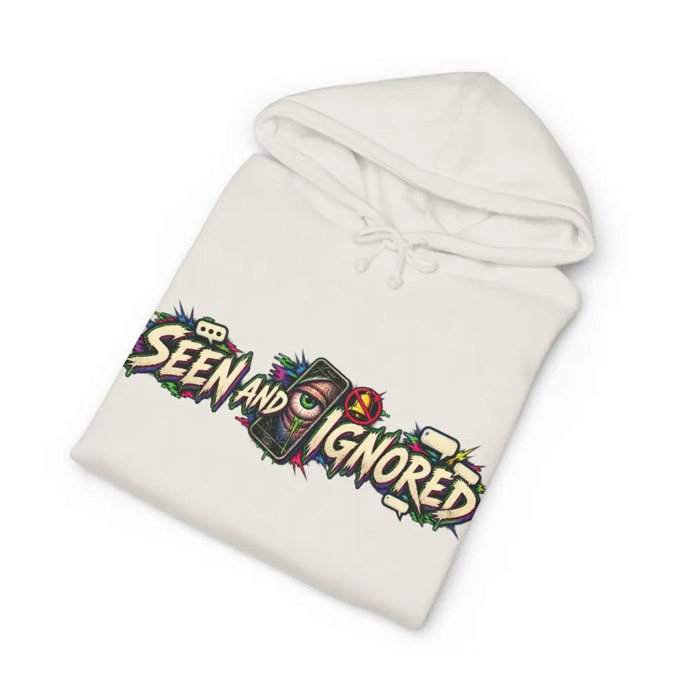 Cream-colored heavyweight hooded sweatshirt with vibrant graffiti style seen and ignored graphic for family group chat use
