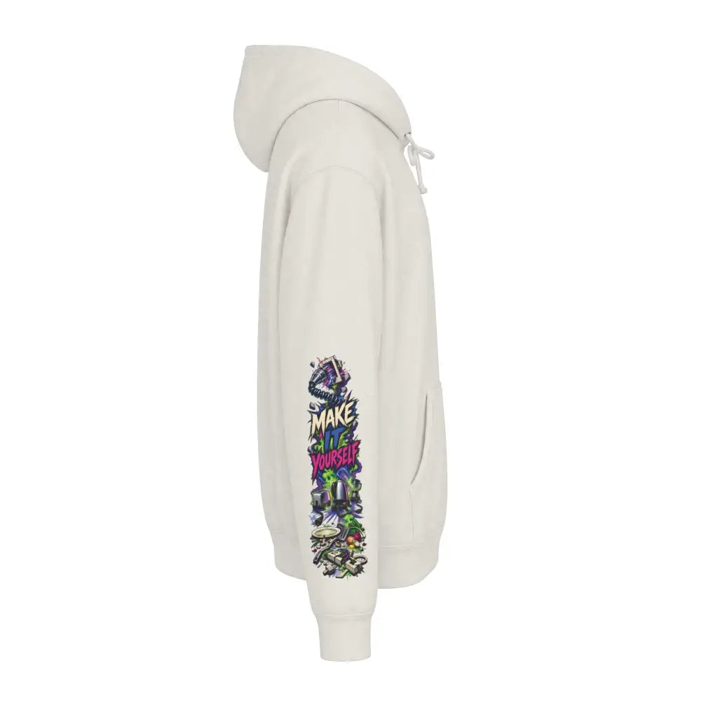 Cream-colored heavyweight hooded sweatshirt with vibrant graffiti-style graphic and bold text on the left sleeve