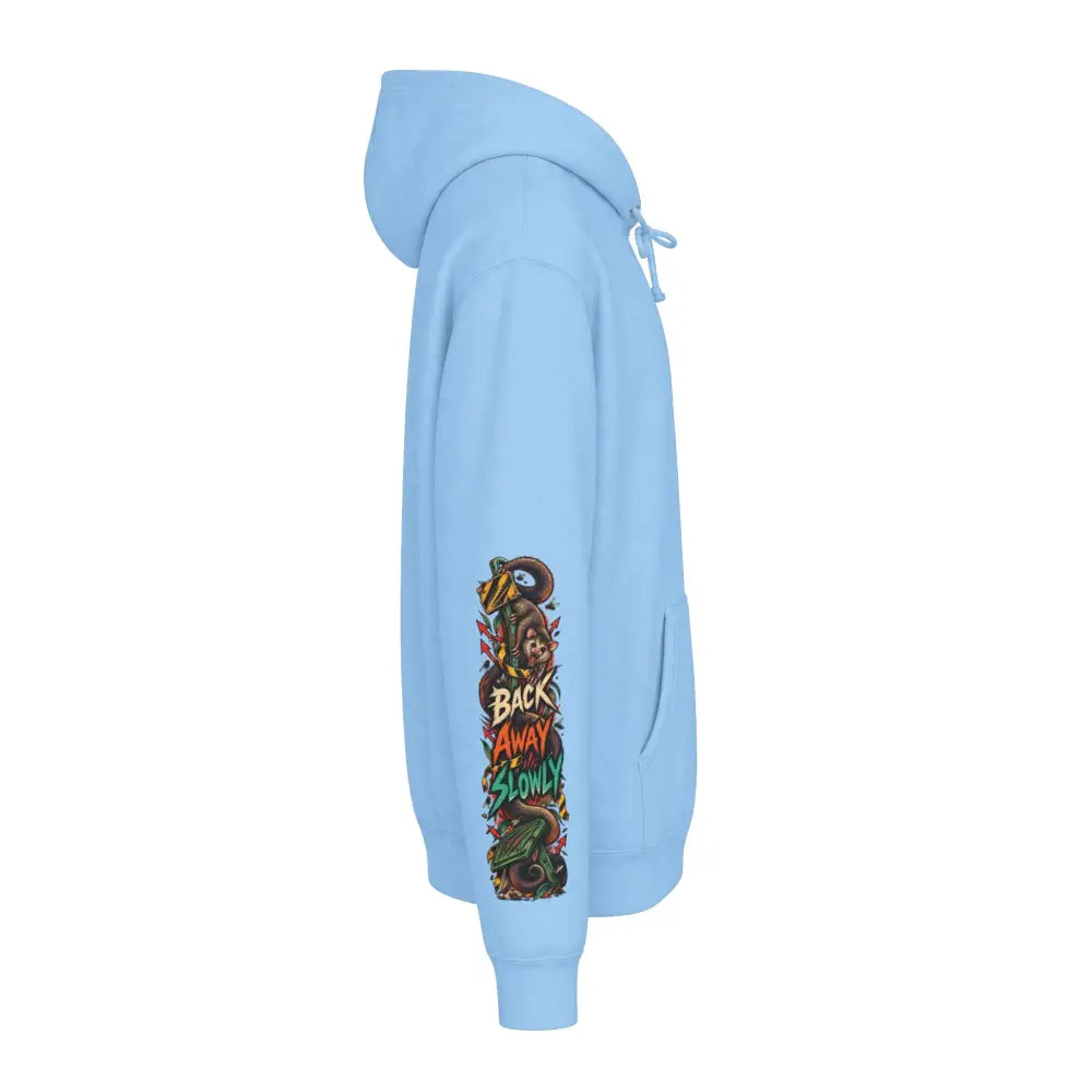 Light blue heavyweight hooded sweatshirt featuring a vibrant wildlife warning graphic on the left sleeve with animals and text back away slowly