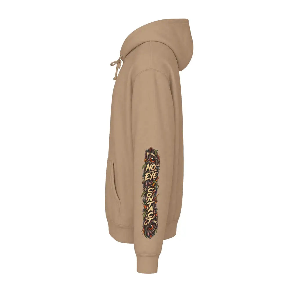 Tan heavyweight hooded sweatshirt with no eye contact owl eyes graphic and foliage along the left sleeve