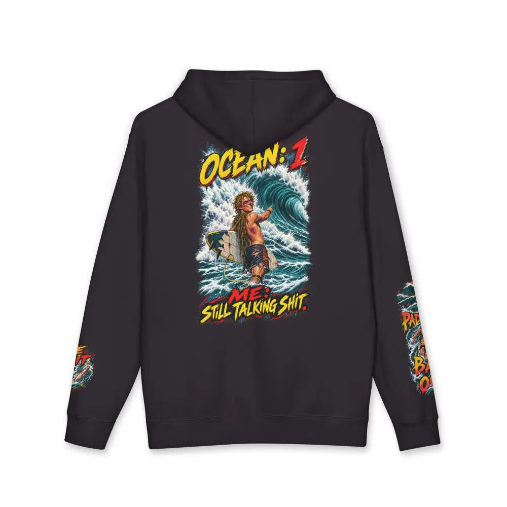 Black unisex surf hoodie with vibrant surfer graphic and ocean me still talking shit text machine wash max 30c care instructions