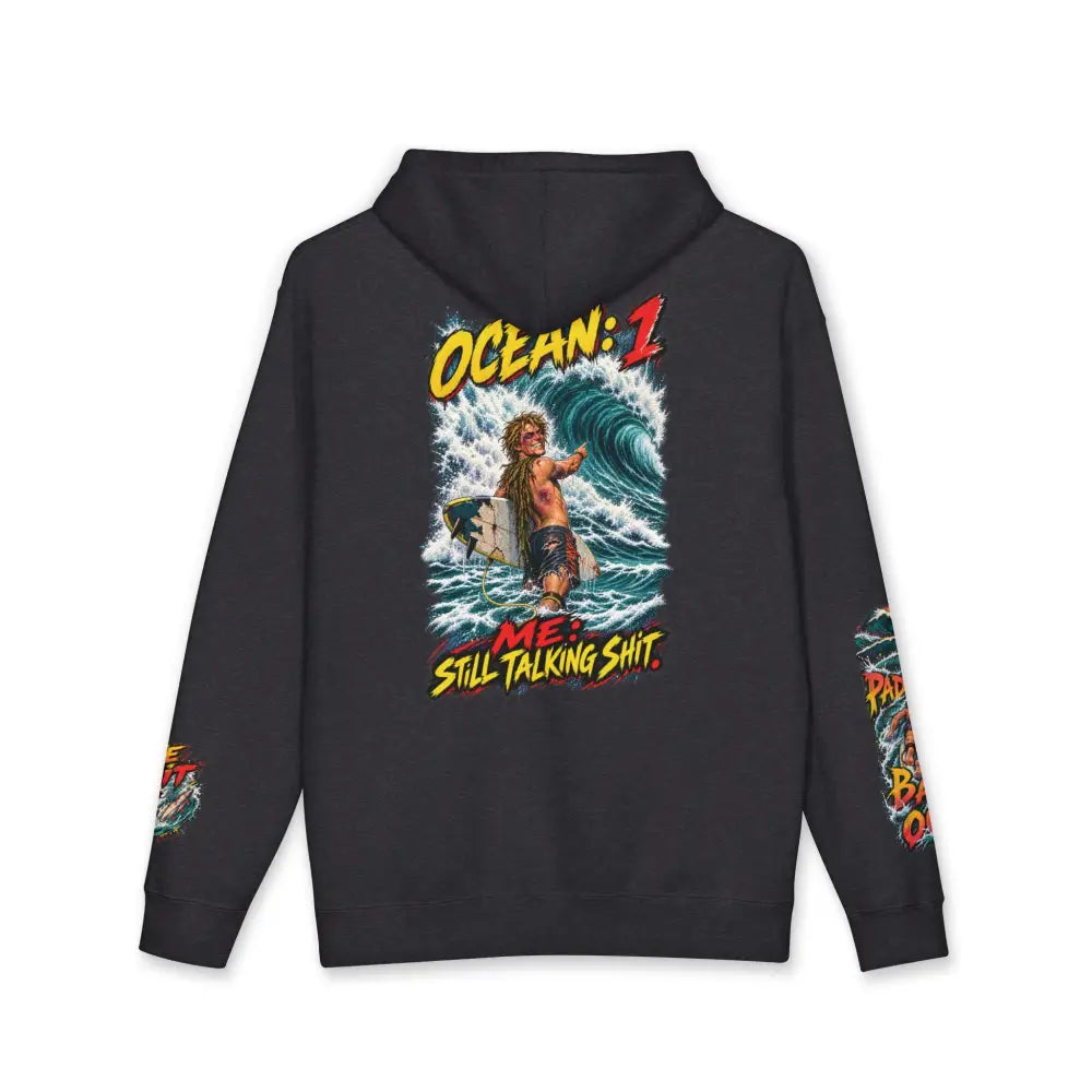 Black unisex surf hoodie with vibrant surfer graphic and ocean me still talking shit text machine wash max 30c care instructions
