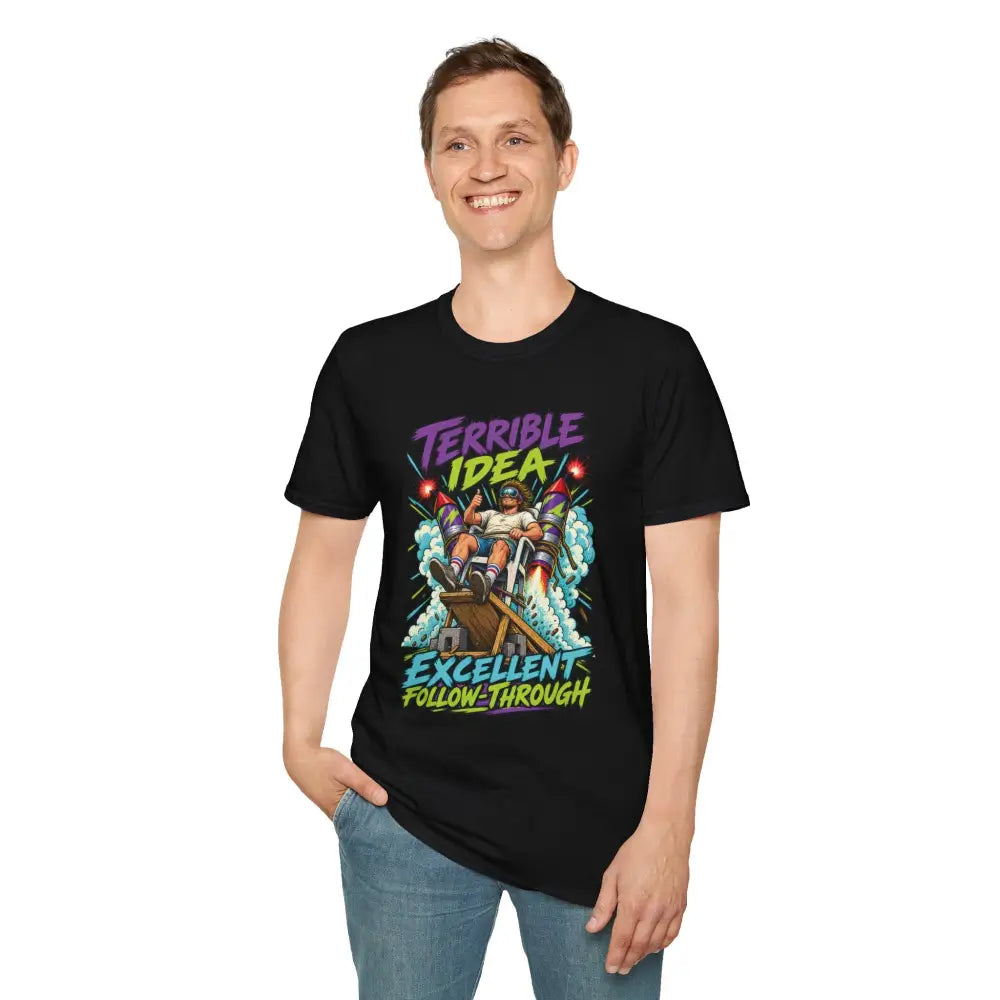 Black unisex t-shirt with colorful retro rocket graphic and text terrible idea excellent follow-through low heat tumble dry care instructions