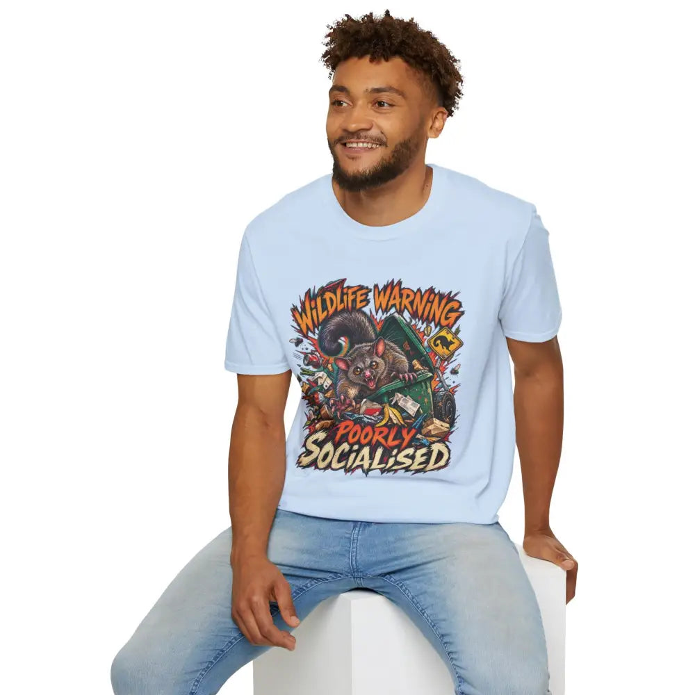 Light blue ring-spun cotton unisex t-shirt with cartoon possum graphic wildlife warning design, low heat care instructions