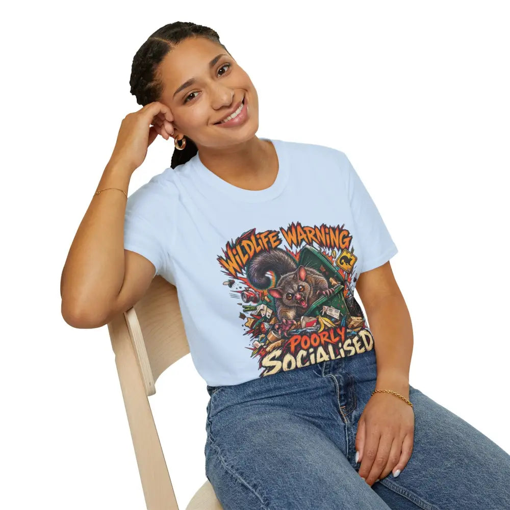 Light blue ring-spun cotton unisex t-shirt with colorful cartoon possum and wildlife warning design care instructions low heat