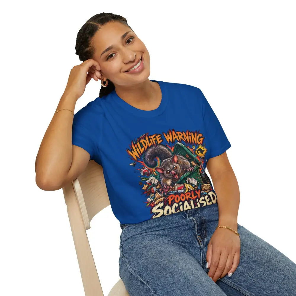 Blue unisex t-shirt made of ring-spun cotton with a colorful wildlife warning cartoon possum design and low heat care instructions